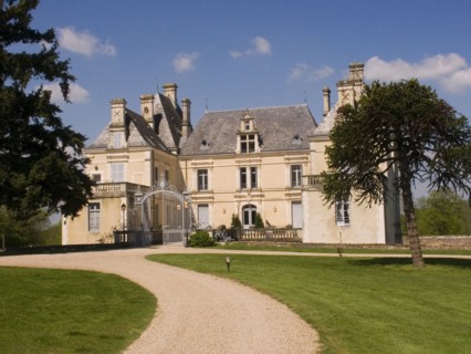 FRANCE, Deux Sevres Region, Poitiers, Gravelled path leading up to the iron entrance gate of the