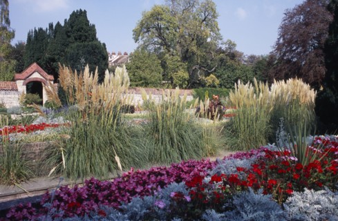 ENGLAND, East Sussex, Lewes, Southover Grange Gardens. Colourful flower bedding displays