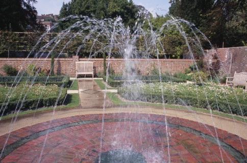 ENGLAND, East Sussex, Lewes, Southover Grange Gardens. Walled garden with central water fountain