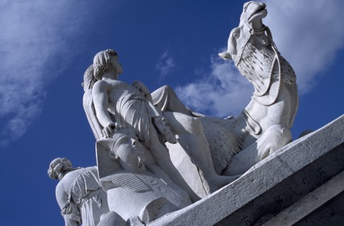 ENGLAND, London, Kensington Gardens. One of the four statues surrounding the Royal Albert Memorial