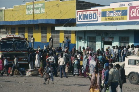 KENYA, Isiolo, Frontier town for north eastern Kenya. Crowds at bus station.