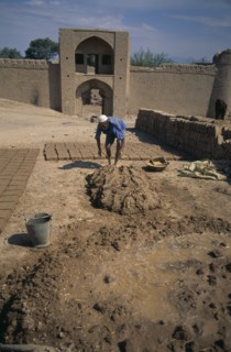 IRAN, Yazd Province, Meybod, Mud brick maker
