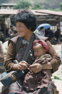 BHUTAN, People, Woman in national dress or kira consisting of rectangular piece of cloth wrapped