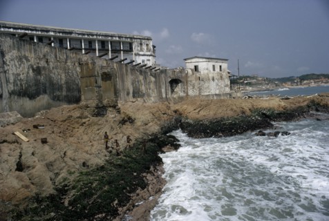 GHANA, Cape Coast, Cape Coast Castle.  Line of cannons along seventeenth century castle ramparts