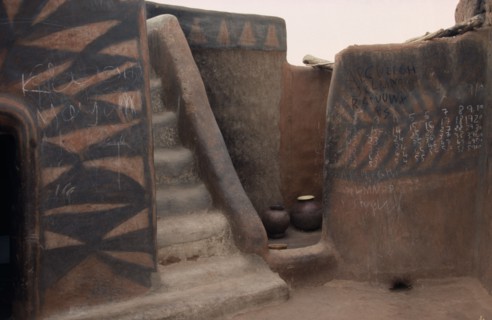 GHANA, North, Architecture, Traditional mud architecture.  Steps to flat roof where crops are dried