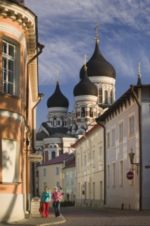 ESTONIA, Tallinn, Two women walking through the Toompea district of the Old Town with Alexander