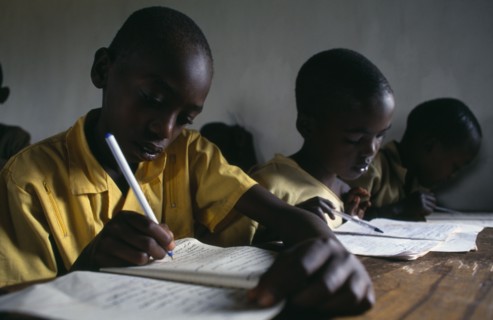 RWANDA, Akagera, Mixed Hutu andTutsi pupils at school.  New classrooms have been built to cope with