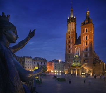 POLAND, Krakow, St Mary's Church in Rynek Glowny with part of the Adam Miekiewicz Memorial in the