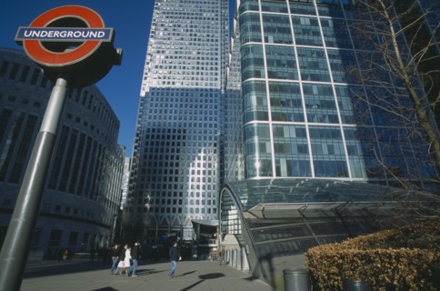 ENGLAND, London, Canary Wharf. View of the tower at 1 Canada Square with Underground in the