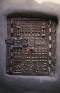 MALI, Bandiagara Escarpment, Sangha, Detail of carved granary door.