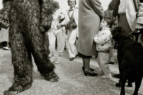 FRANCE, Bouches du Rhone, Arles, "A child watches as the crowd passes wearing fancy dress during a