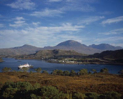 SCOTLAND, Highlands, Torridon, "Sheildaig Village with cruise ship, Hebridean Princess, in front of