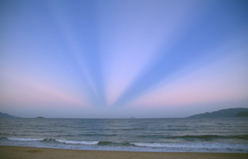 VIETNAM, South, Nha Trang, Unusual atmospheric phenomenon in sky at dusk over sea.