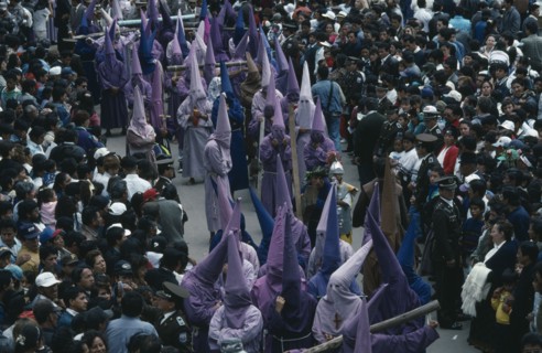 ECUADOR, Pichincha, Quito, Good Friday procession through the Plaza de San Francisco with hooded