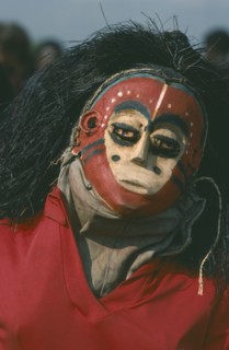 GABON, Gunga, Masked dancer at Gunga festival.