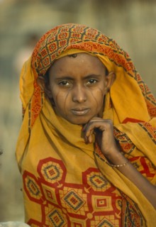 SUDAN, Tribal People, Portrait of Eritrean refugee woman with facial scarification and wearing