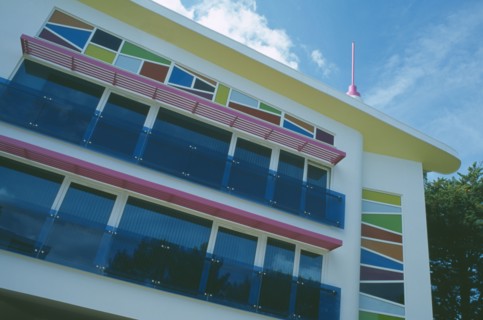 ENGLAND, Dorset, Sandbanks, View of colourful apartment block called Lucys hill.