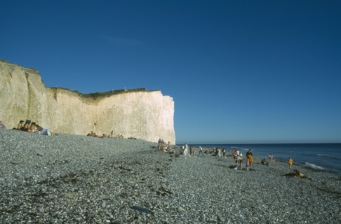 ENGLAND, East Sussex, Birling Gap, Occupied peeble beach and section of cliff face