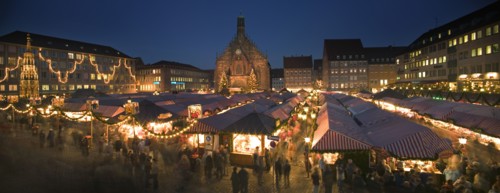 GERMANY, Bavaria, Nuremberg, Panoramic view of the Christmas Market in Hauptmarkt with The