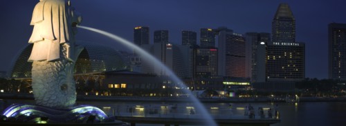 SINGAPORE, Merlion Statue, Night time view of the Esplanade - Theatres on the Bay complex from