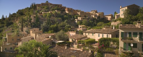 SPAIN, Balearic Islands, Mallorca, Deia. Panoramic view of the village.