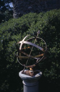 UNITED KINGDOM, Channel Islands, Guernsey, St Martins. Sausmarez Manor. Gold Sundial on plinth in