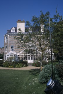 UNITED KINGDOM, Channel Islands, Guernsey, St Martins. Sausmarez Manor. View from sculpture garden