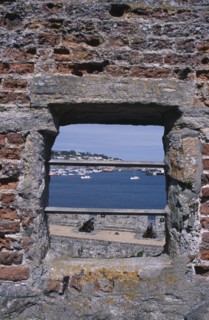 UNITED KINGDOM, Channel Islands, Guernsey, St Peter Port. Castle Cornet. View through battlement