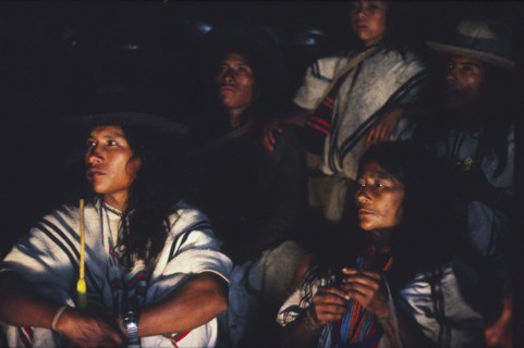 COLOMBIA, Santa Marta, Sierra Nevada , Ica family sat down and listening to Ica elder talking at