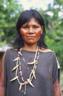 PERU, Nuevo Mundo, Camisea, Machiguenga Indian woman wearing beaded necklaces.