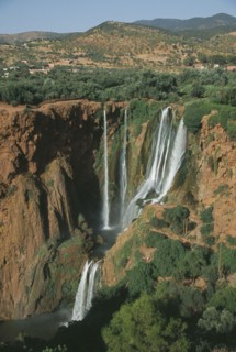 MOROCCO, Middle Atlas, Cascades d’Ouzoud, Waterfalls of the Olives.  Multiple falls cascading over
