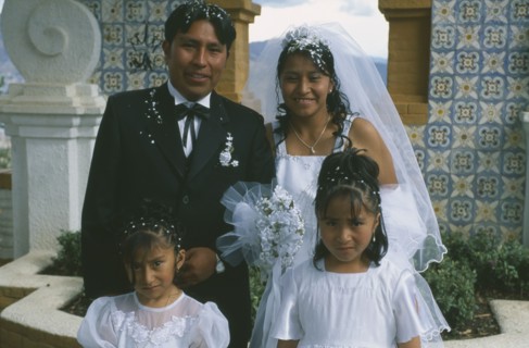 BOLIVIA, La Paz, "Wedding in El Monticulo. Bride, Groom and two young bridesmaids."