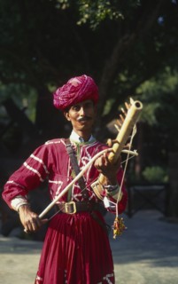 INDIA, Rajastan, Musician with Tambora instrument.