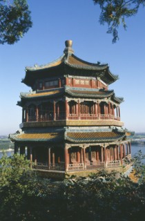 CHINA, Hebei, Beijing, The summer Palace framed by tree branches.