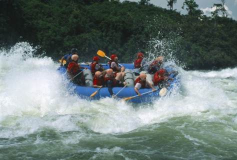 UGANDA, Jinja, Bujugali Falls. White water rafting near the source of the Nile.