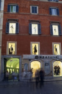 ITALY, Lazio, Rome, Piazza di Spagna.  Facade of multi storey clothes shop.