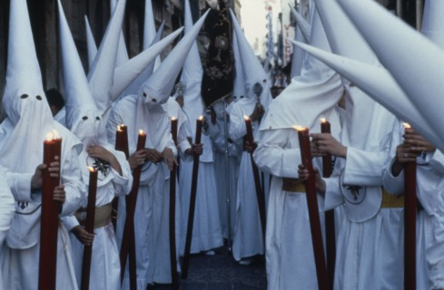 SPAIN, Andalucia, Seville, Semana Santa Holy Week penitents.