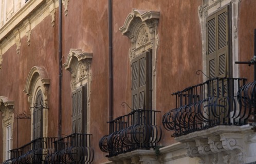 ITALY, Sicily, Syracuse, Detail of ornate windows and balconies