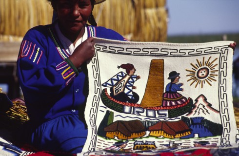 PERU, Puno Administrative Department, Lake Titicaca, "Uros floating islands/Aymara woman. The