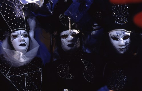 CROATIA, Kvarner, Rijeka, Mask carnival trio in Venetian masks. Venetian style masks are synonomous