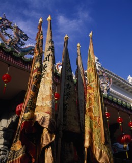 MALAYSIA, Penang, Georgetown, Chinese temple roof hung with red lanterns for Chinese New Year with