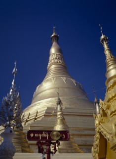 MYANMAR, Yangon, Shwedagon Paya.  Golden exterior of main stupa.
