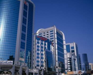 UAE, Dubai, Dubai Concorde Hotel and Residence on Al Maktoum Road.  Modern glass fronted exterior