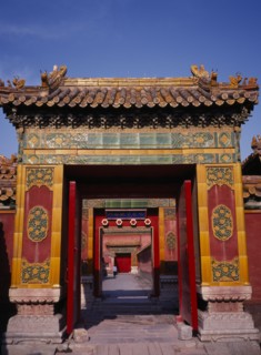 CHINA, Beijing, Forbidden City.  Looking through highly decorated sequence of doorways.