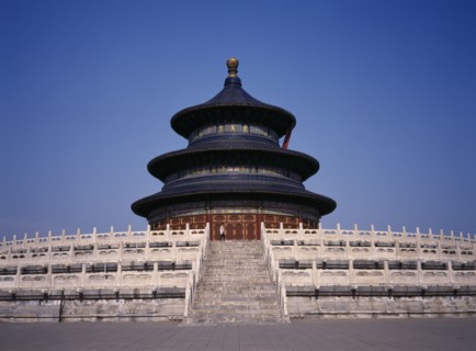 CHINA, Beijing, Temple of Heaven.  Hall of Prayer for Good Harvests with western tourist standing