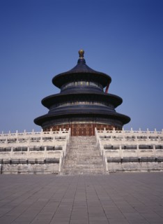 CHINA, Beijing, Temple of Heaven.  Hall of Prayer for Good Harvests with western tourist standing