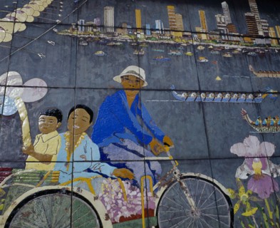 SINGAPORE, Orchard Road, "Painted mural depicting city skyline, dragon boat racing, orchids and
