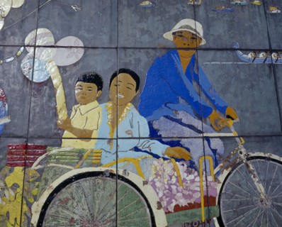 SINGAPORE, Orchard Road, "Painted mural depicting city skyline, dragon boat racing, orchids and