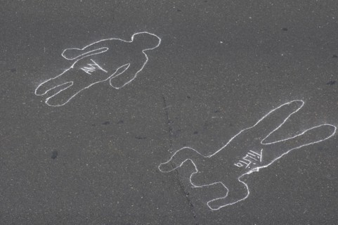 VENEZUELA, Caracas, Chalk outlines with the names of participants in an event on Avenida Francisco