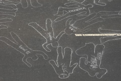 VENEZUELA, Caracas, Chalk outlines with the names of participants in an event on Avenida Francisco